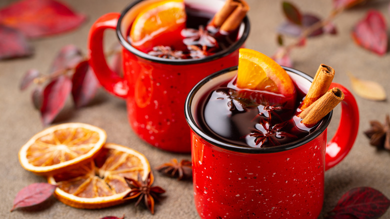 Mulled wine with fruit in mugs