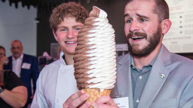 Admiring giant ice cream cone