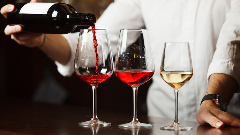 Sommelier pouring wine