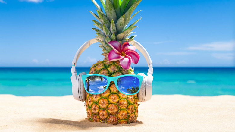 Pineapple with sunglasses and headphones