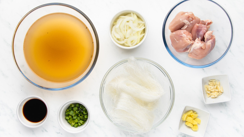 Hawaiian-style chicken long rice soup ingredients laid out