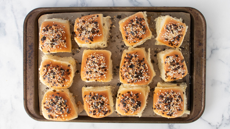 Seasoned rolls on baking sheet