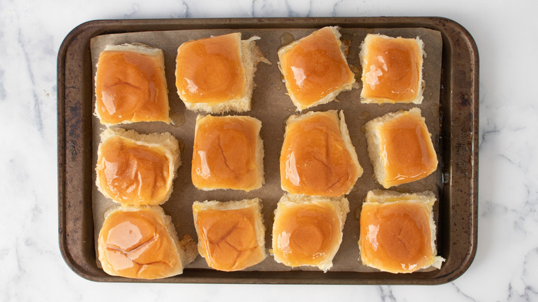 Buttery rolls on baking sheet