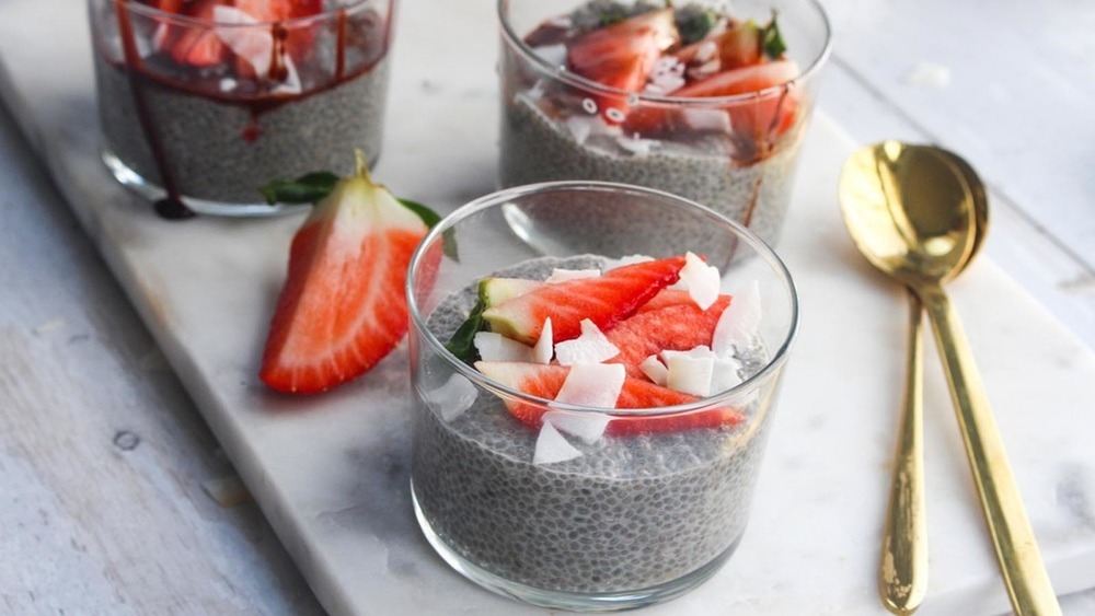 Chia Seed Pudding with strawberries and coconut flakes