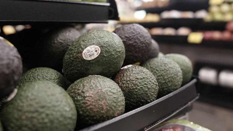 avocados on a store shelf