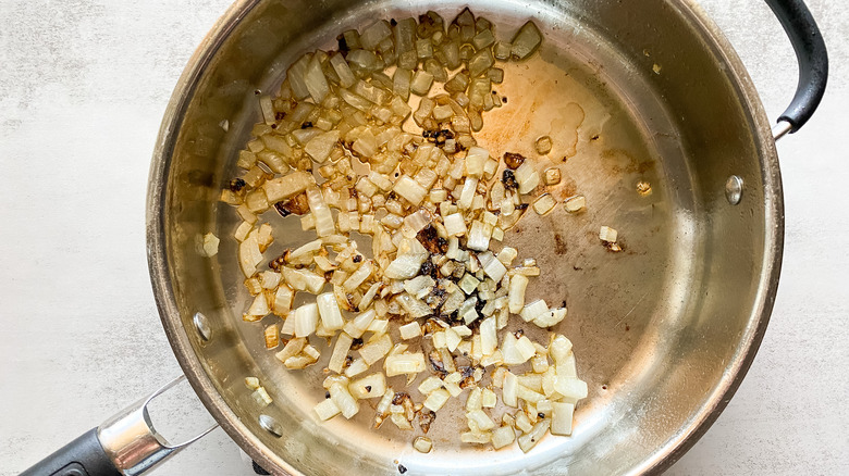 sauteed onions and garlic in pan