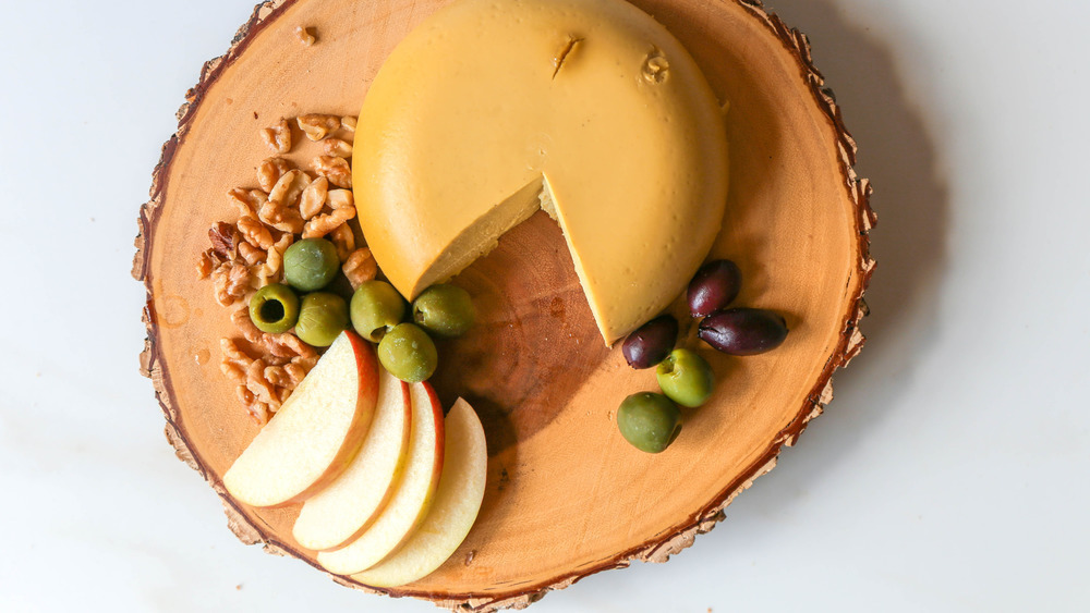 Vegan Cheese with apples, olives and walnuts