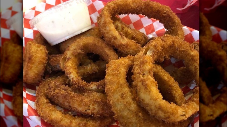 Onion Rings in basket with ranch