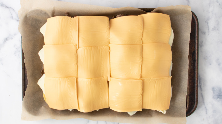 Slider rolls with sliced cheese