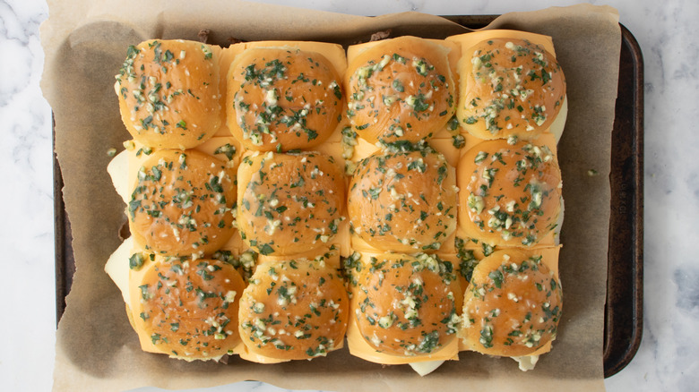 Filled slider rolls covered with chopped parsley