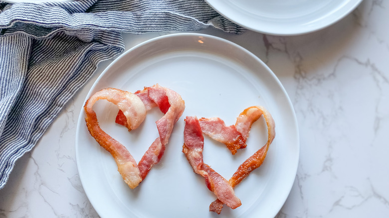 heart-shaped bacon on plate