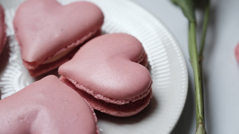 heart-shaped macarons on plate