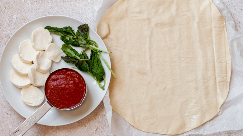 pizza ingredients on counter 