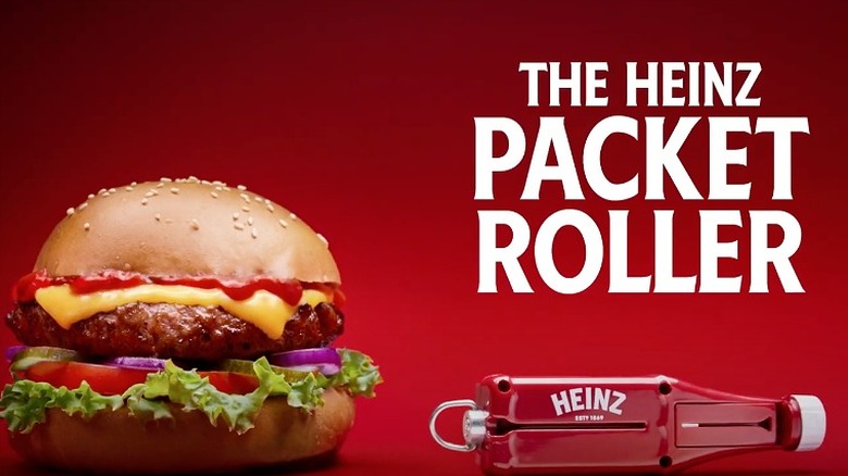 Cheeseburger next to Heinz packet roller tool