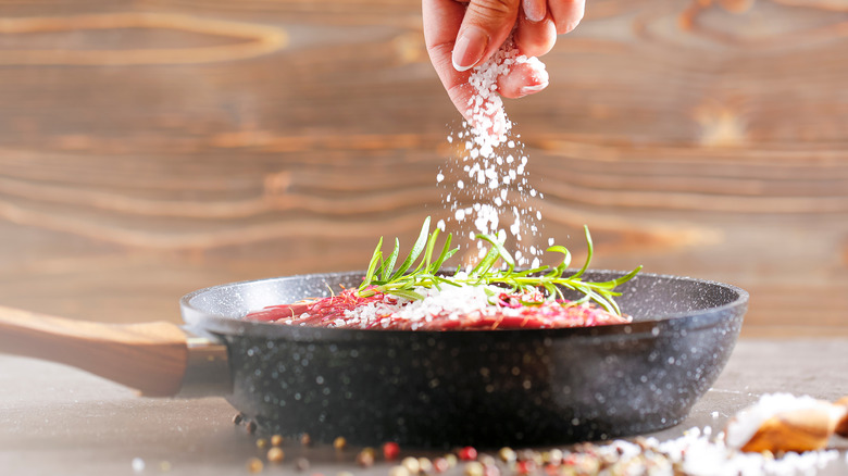 Hand salting food