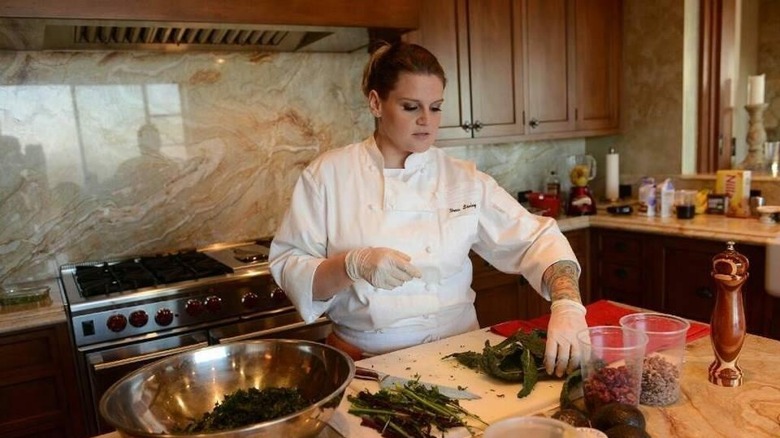 Nona Johnson cooking in kitchen