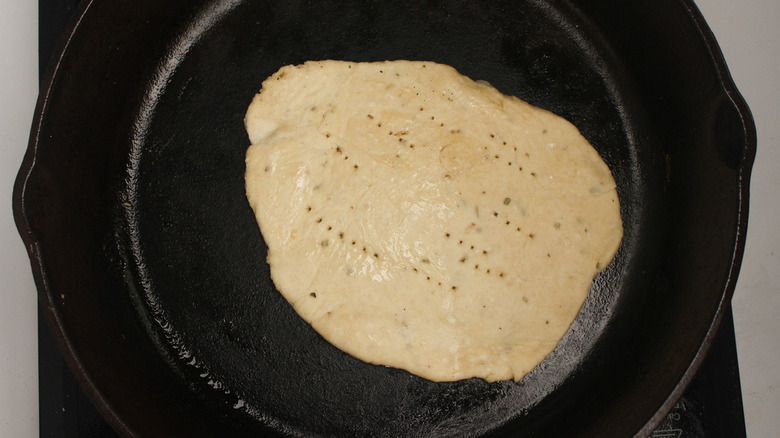 unleavened bread cooking in pan