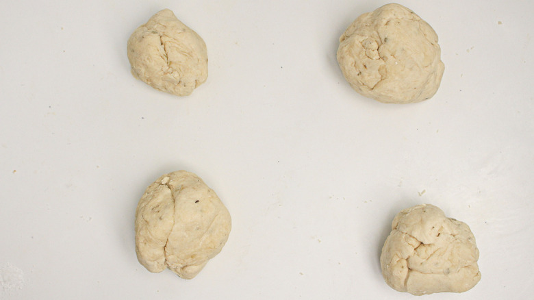 four balls of bread dough