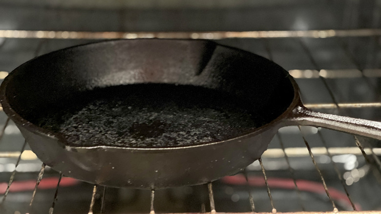 Cast iron pan sitting on oven rack