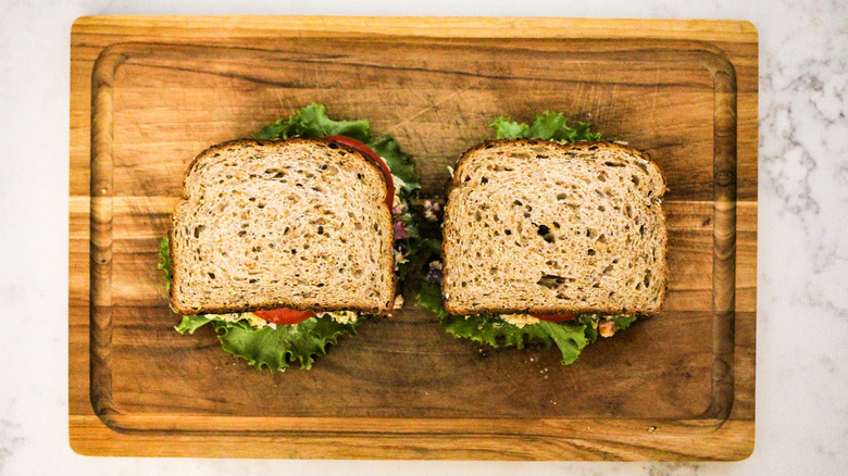 sandwiches on wooden board