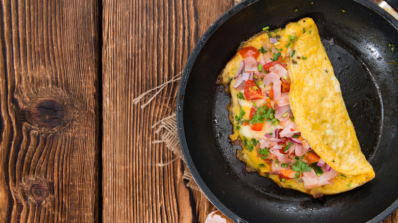 American omelet in skillet