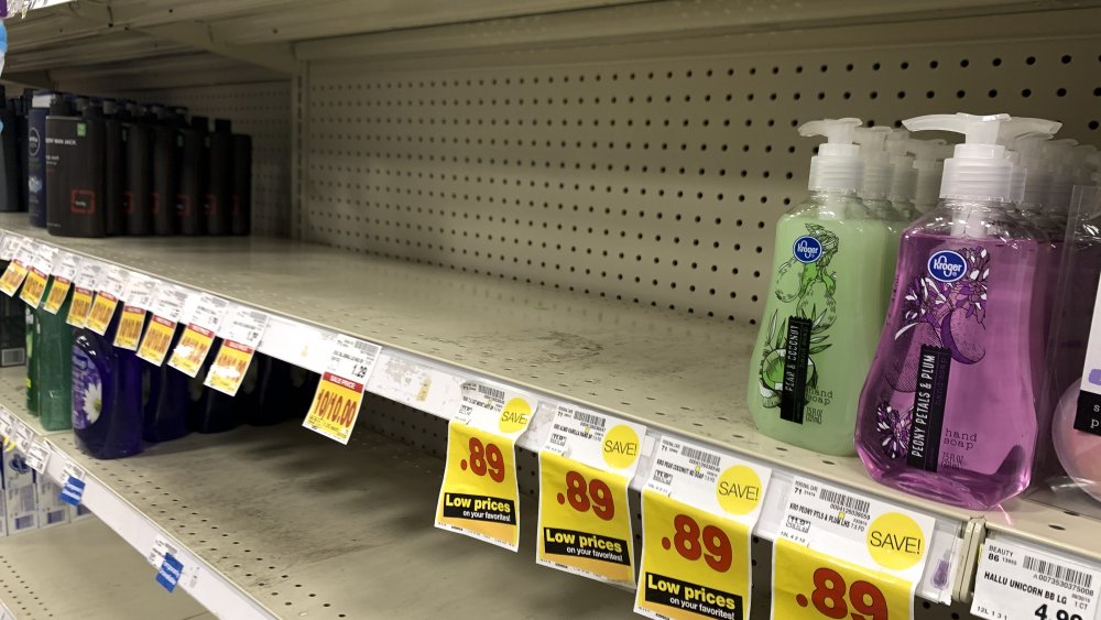 emptying shelf of hand soap and sanitizer