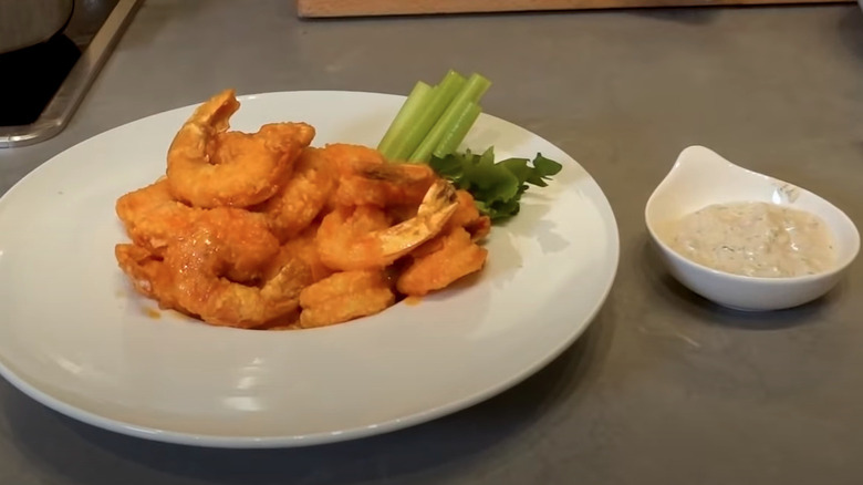 firecracker shrimp and blue cheese dressing in bowls 