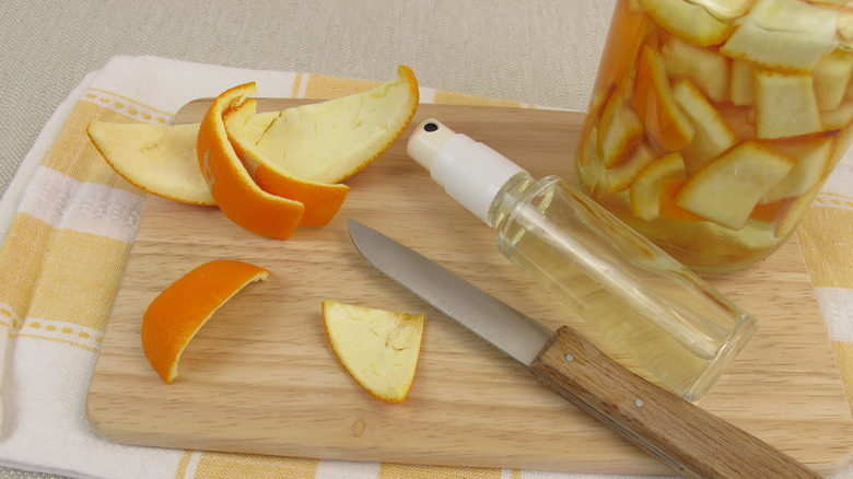 Making orange peel cleaner on cutting board