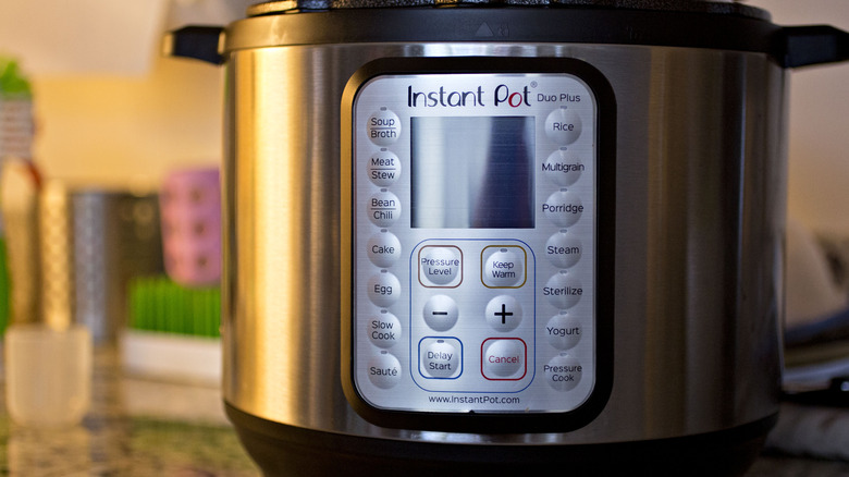 closeup of instant pot buttons