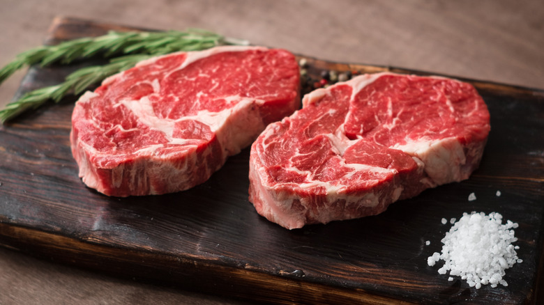 Raw ribeye steaks