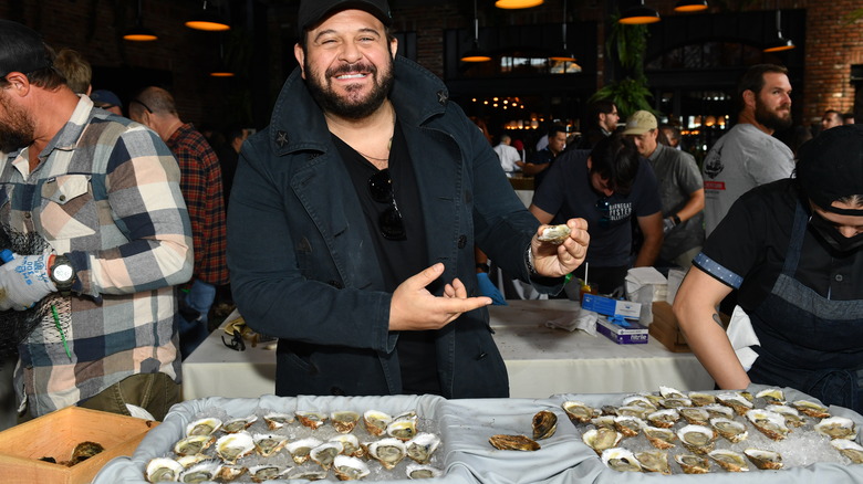 Adam Richman with some oysters