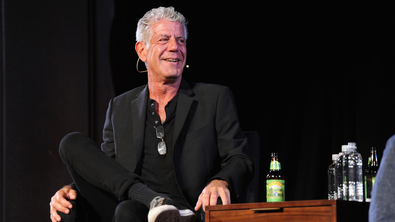 Anthony Bourdain smiling at event