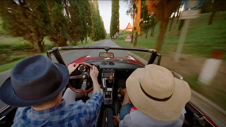 bobby flay driving, film crew camera setup