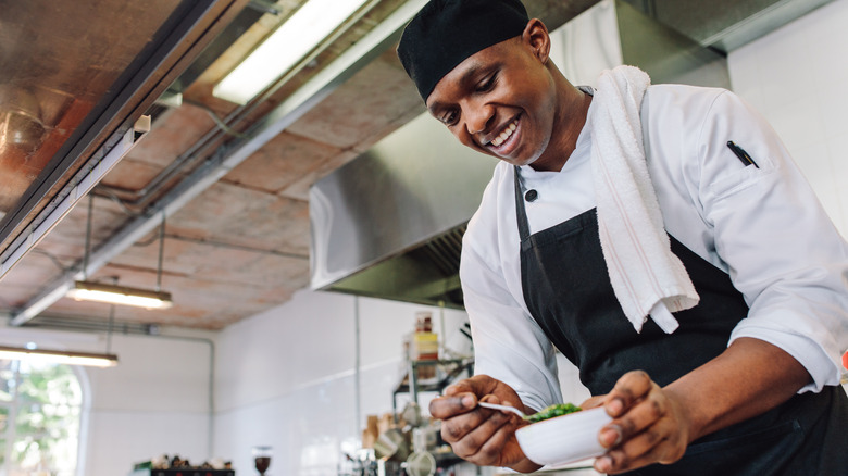 A happy chef in a kitchen