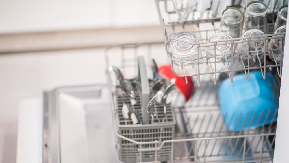 Clean dishes in a dishwasher