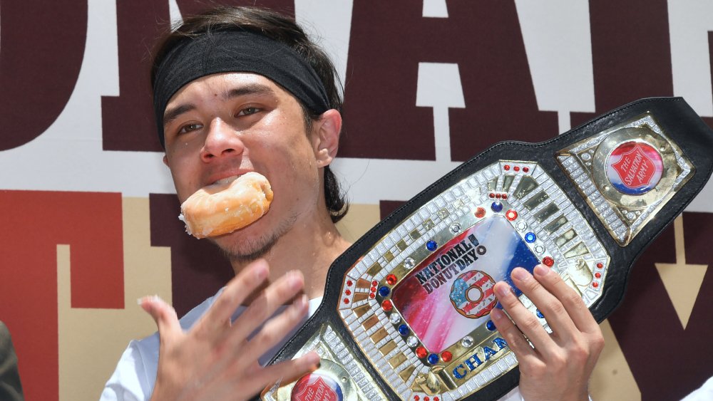 Matt Stonie eating a doughnut