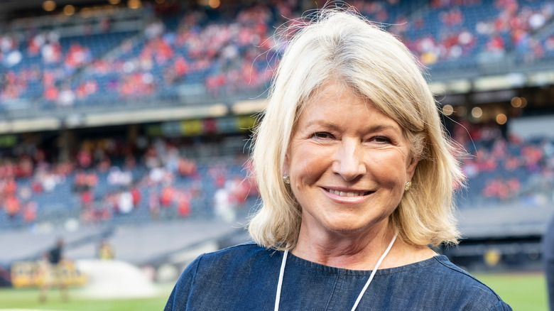 Martha Stewart smiling at a stadium