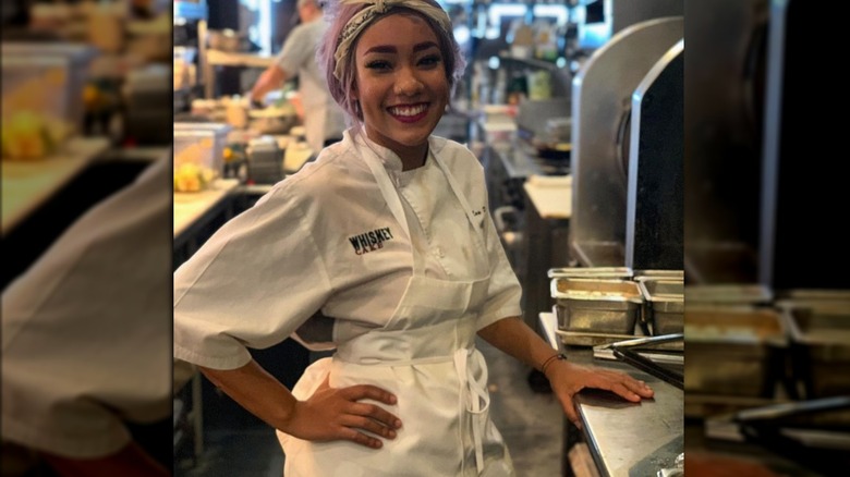 Chef Mary Lou Davis smiling in chef's whites