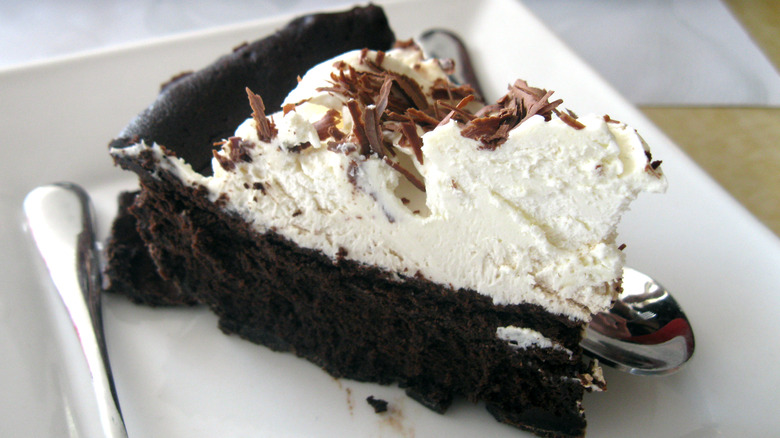 Slice of Mississippi mud pie on white plate