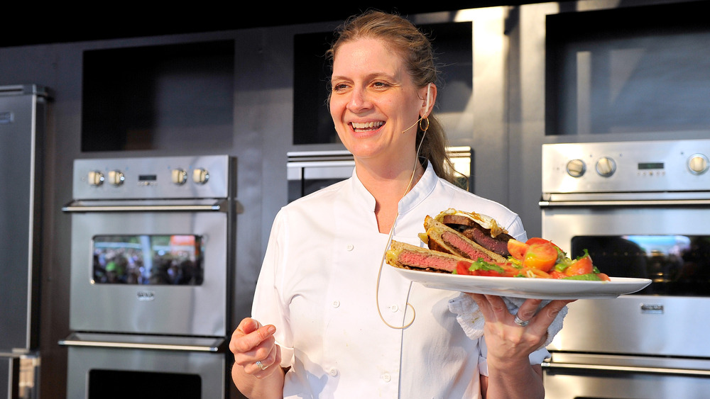 Amanda Freitag presenting a dish