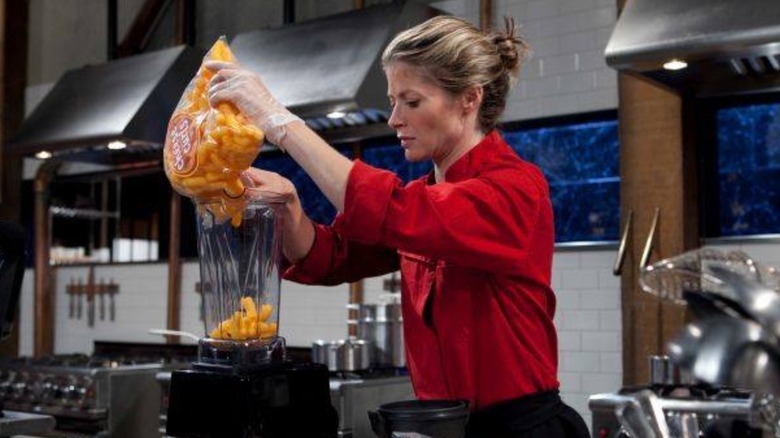 Contestant cooking on Chopped