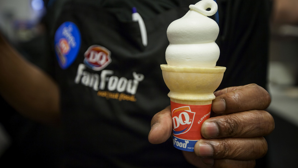 Hand holding a Dairy Queen cone