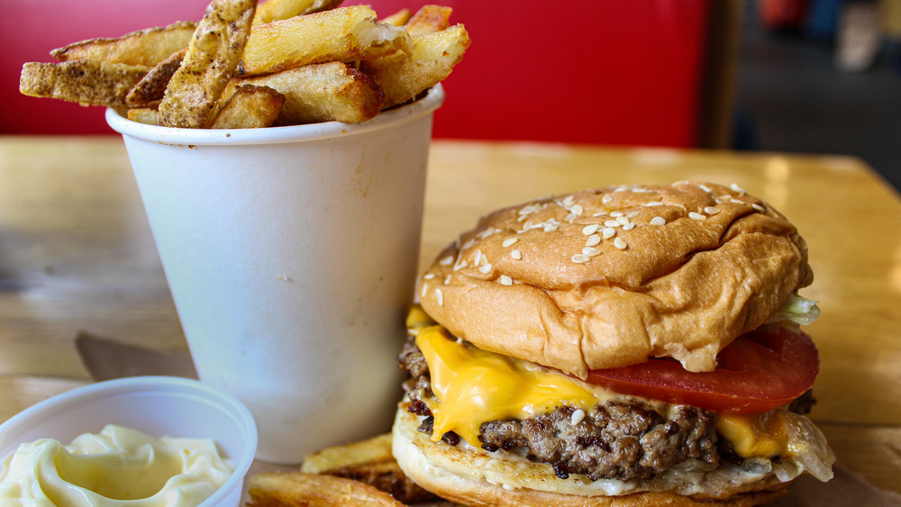 Five Guys burger and fries in a cup