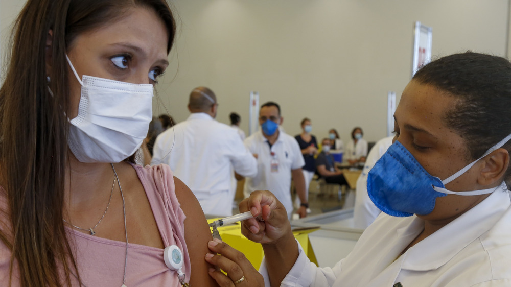 Person receiving COVID vaccine