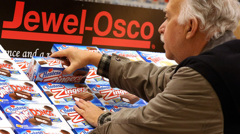 Customer buying chocolate at Jewel-Osco store