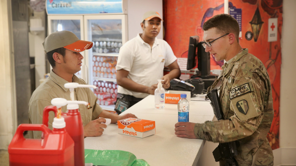 Popeyes employees and customer