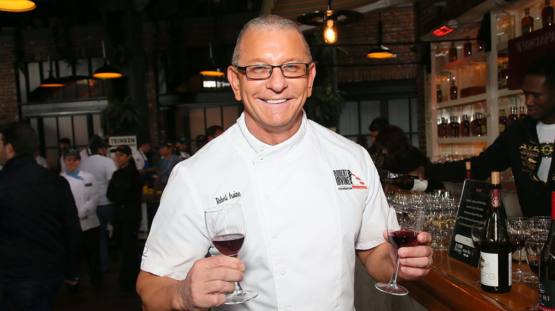 Robert Irvine smiling for the camera