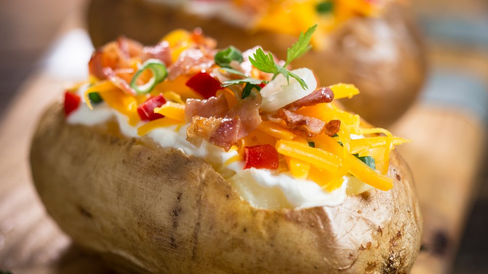 baked potatoes with cheese and bacon