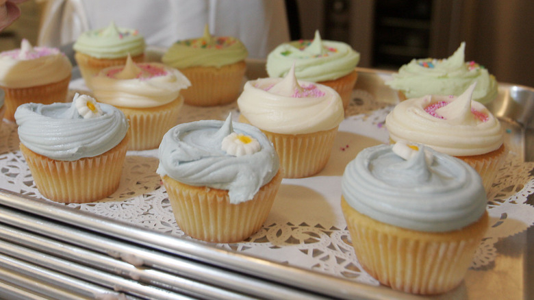 Magnolia Bakery vanilla cupcakes on a tray