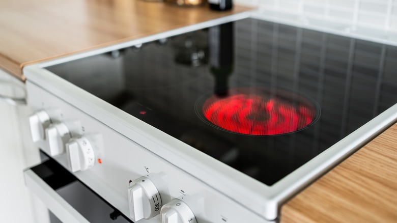 Electric cooktop with hot burner